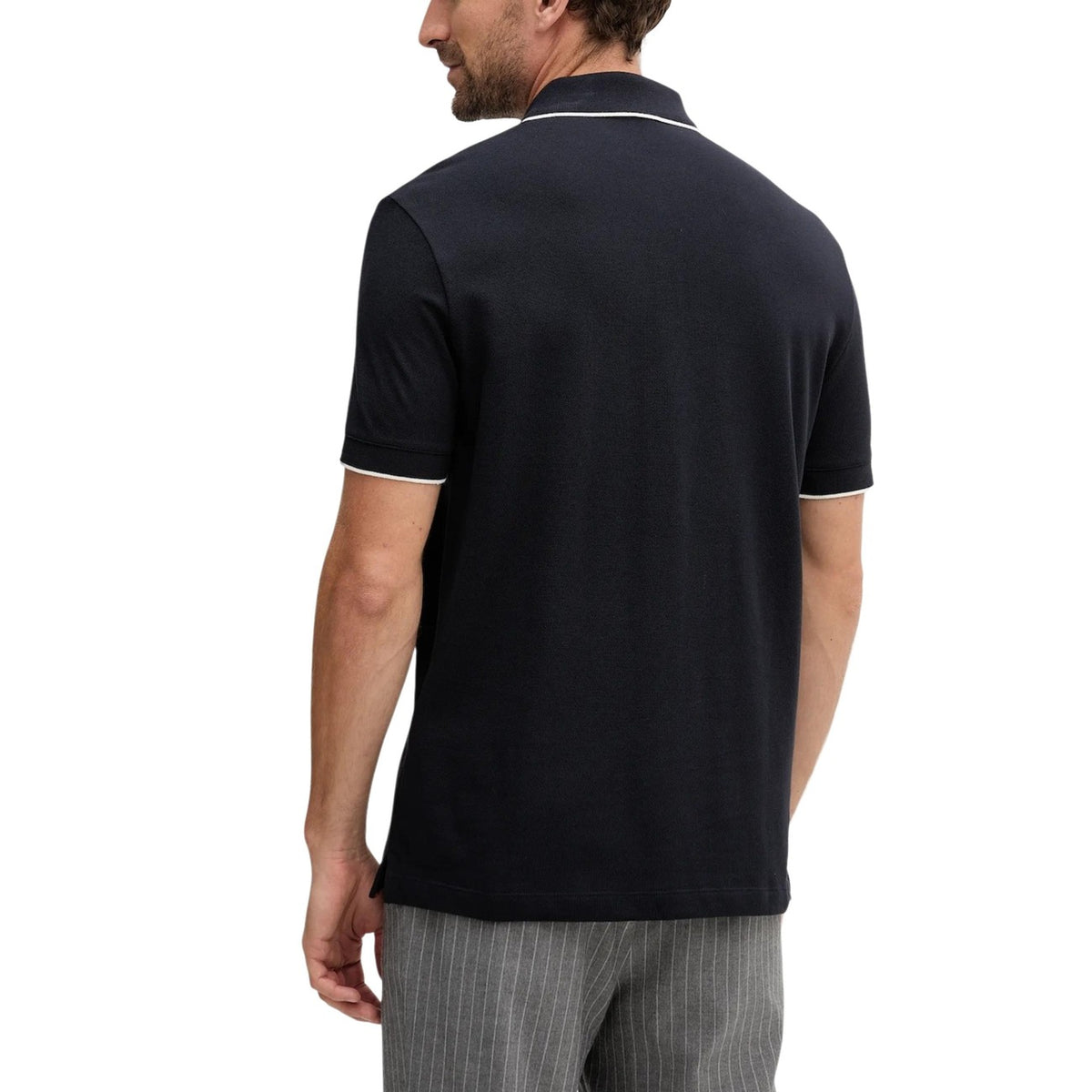 Polo Armani Exchange homme bleu marine liseré blanc — vue de dos portée — Delvale