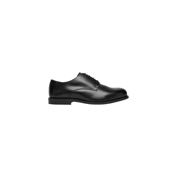 Image 1 : Derbies Calvin Klein homme en cuir noir avec fermeture à lacets, vue de face — Delvale