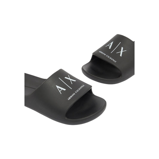 Mules Armani Exchange homme noires vue de dessus — semelle sculptée et motif AX