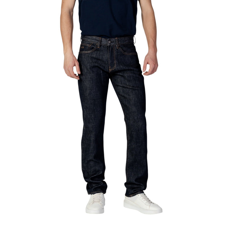 Image 1 : Jean slim Armani Exchange homme bleu indigo monochrome, vue de face — delvale