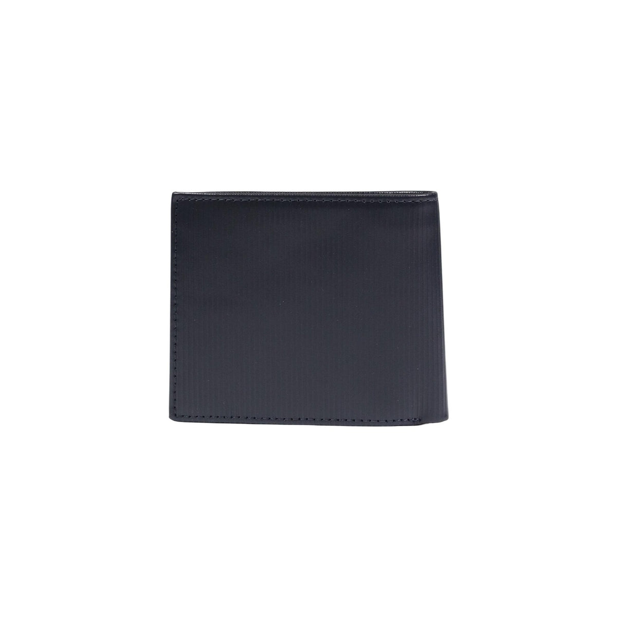Image 3 : Détail du badge logo Tommy Hilfiger émaillé rouge, blanc et bleu sur portefeuille cuir navy homme — Delvale