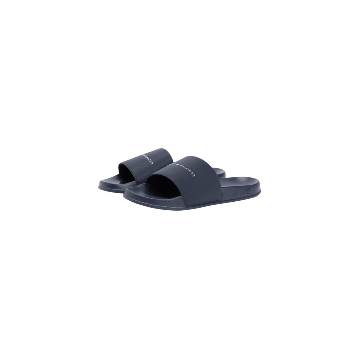 Image 1 : Paire de mules Tommy Hilfiger homme coloris marine vue de trois quarts, bride large avec logo signature blanc — Delvale