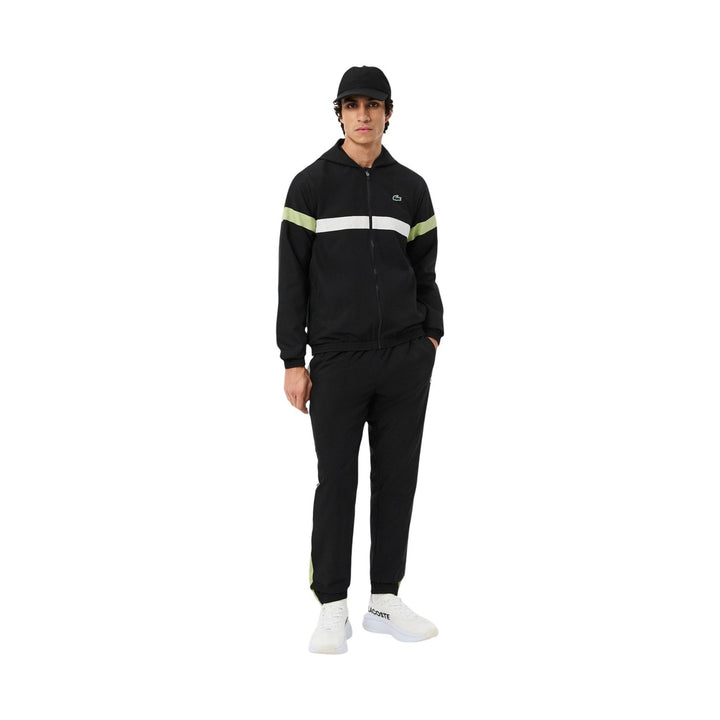 Lacoste Ensemble Survêtement Homme Noir Bande Jaune Fluo Blanc Zippé Capuche — vue de face portée — Delvale