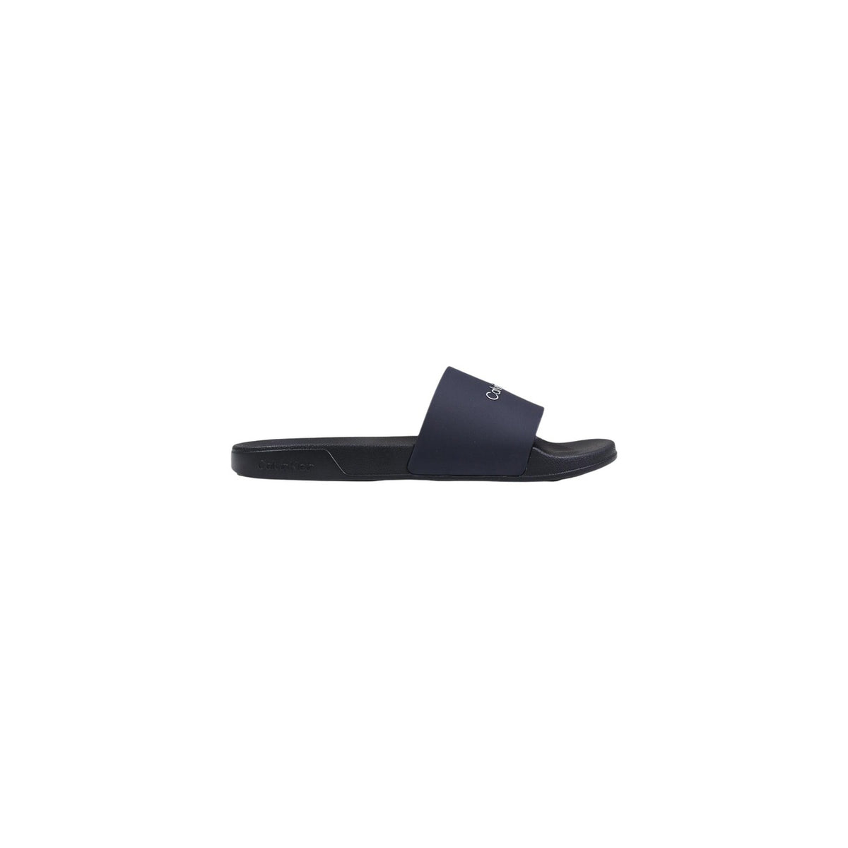 Image 1 : Mules Calvin Klein homme noires en polyuréthane, vue de profil — Delvale