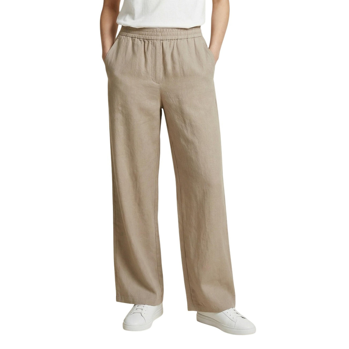 Image 1 : Pantalon Only femme coupe large jambes larges taille élastiquée coloris beige porté avec t-shirt blanc et sneakers blanches — Delvale