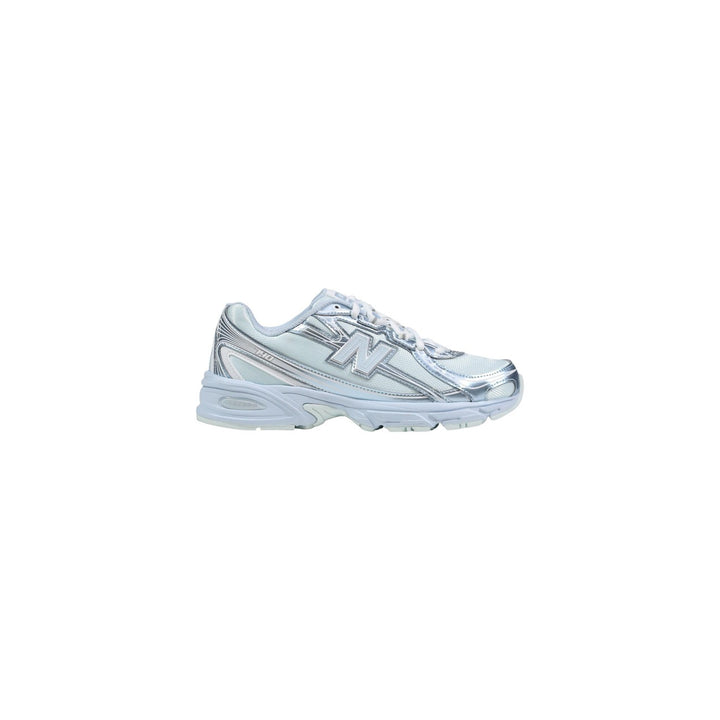 Image 1 : Baskets New Balance 740 femme bleu azur et argenté vue de profil — delvale