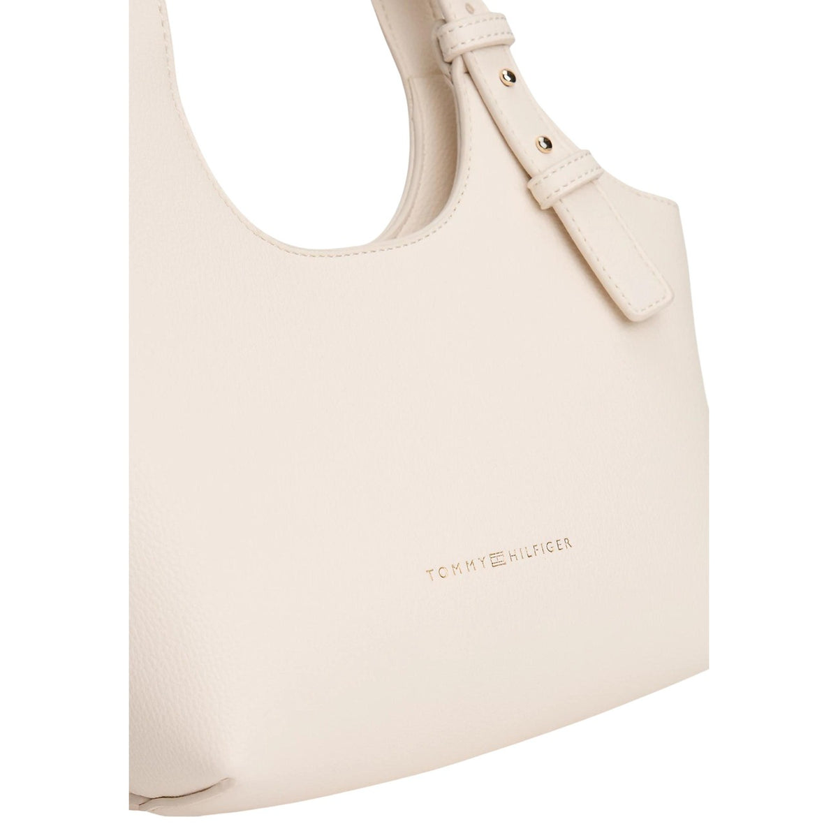 Image 3 : Vue de trois quarts du mini fourre-tout Tommy Hilfiger femme coloris crème, structure compacte et finitions dorées — Delvale
