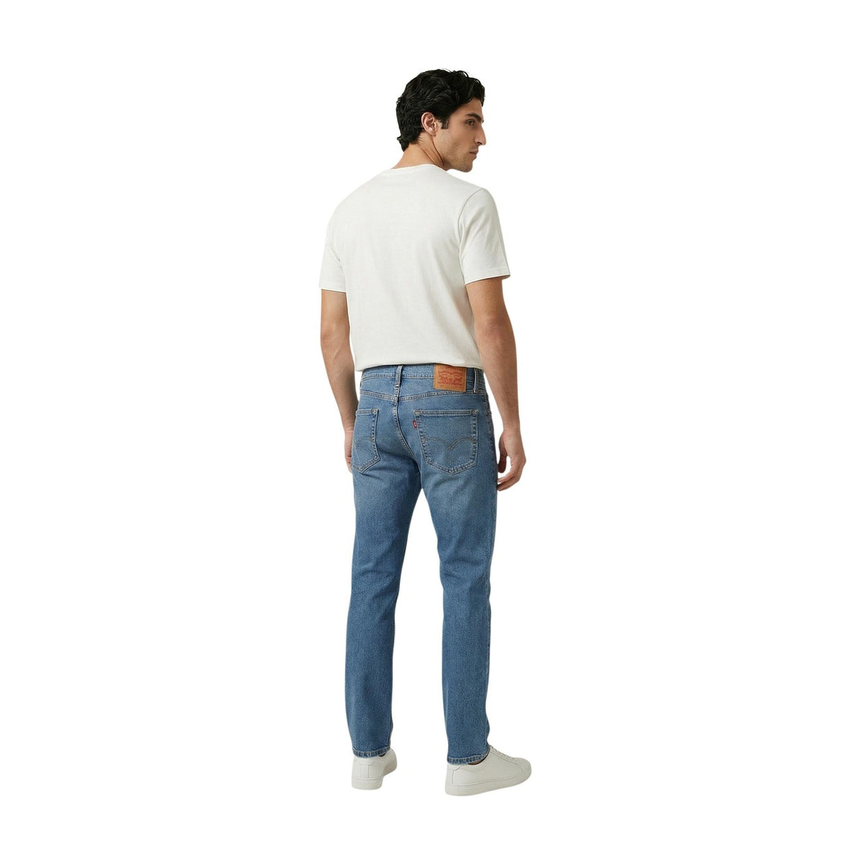 Image 2 : Détail jean slim Levi's® homme denim bleu délavé, fermeture boutons et poches frontales visibles — Delvale