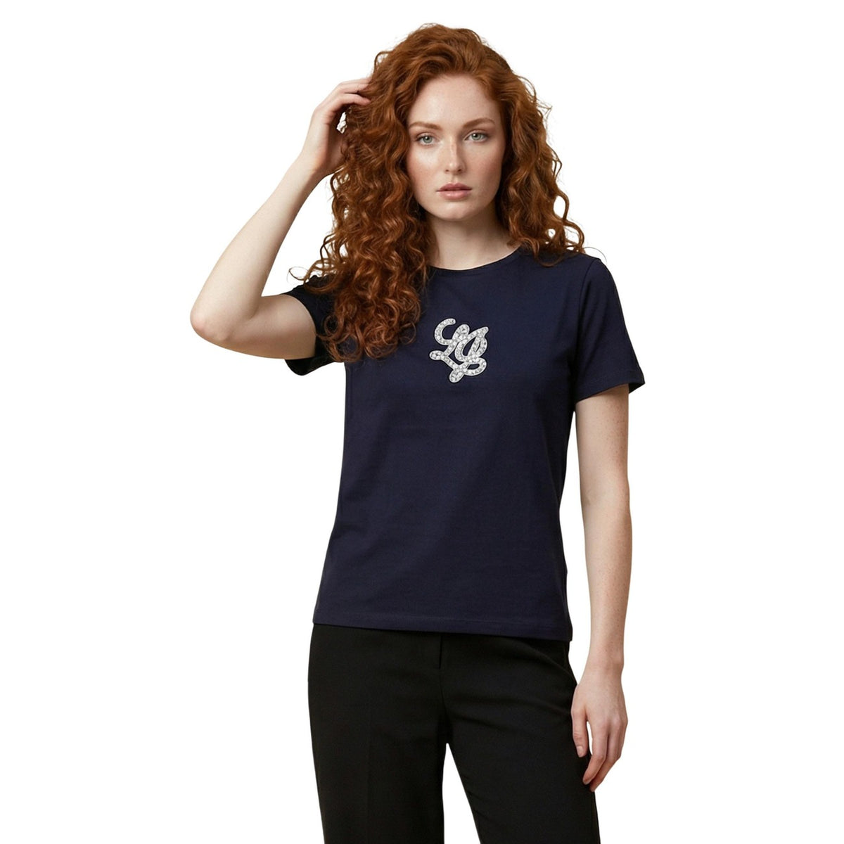 Image 2 : Vue de face du t-shirt Liu Jo bleu marine ajusté, détail du logo strass argenté en relief sur fond uni — Delvale