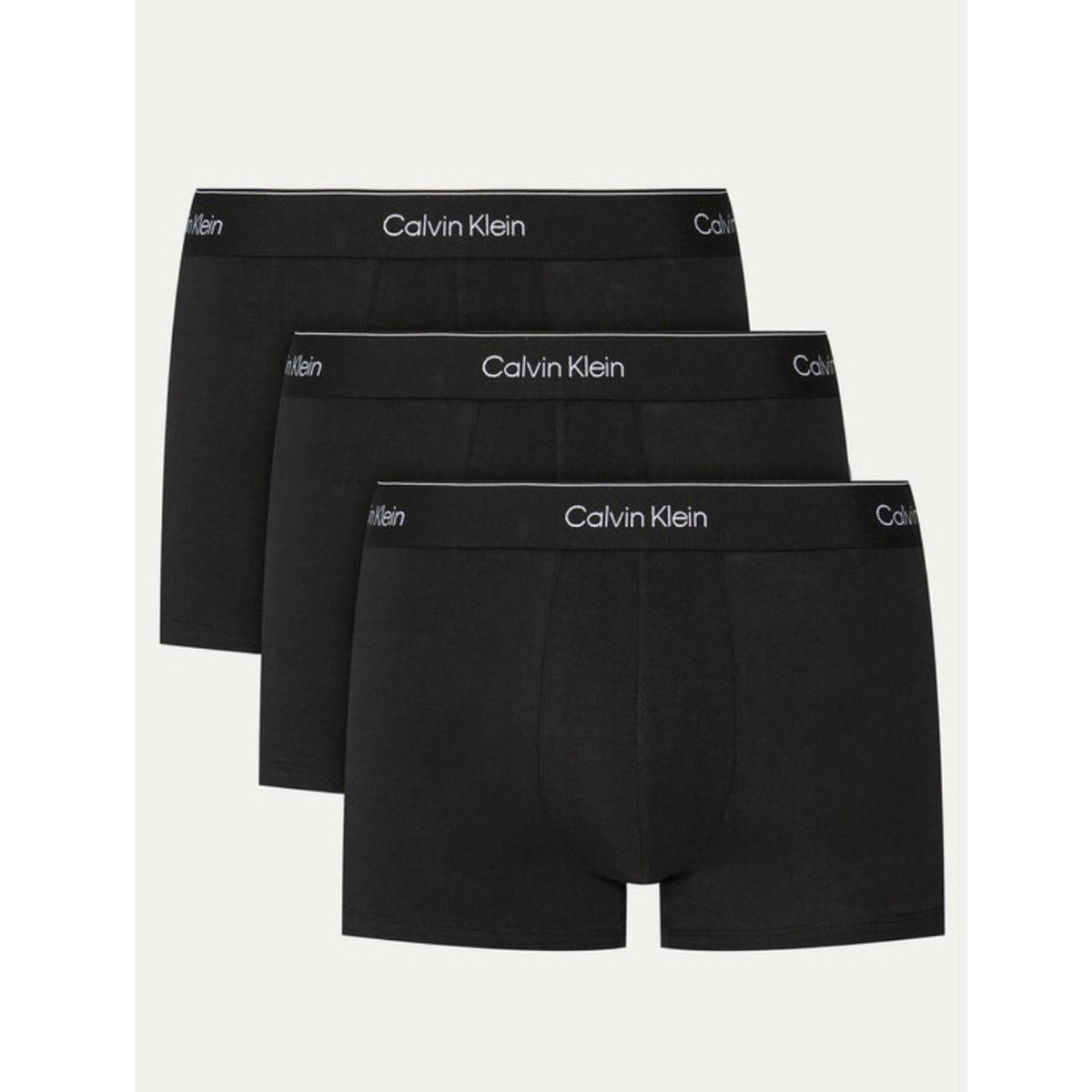 Image 1 : Lot de 3 boxers trunks Calvin Klein Underwear homme coloris noir avec ceinture élastique logo blanc sur fond blanc — Delvale