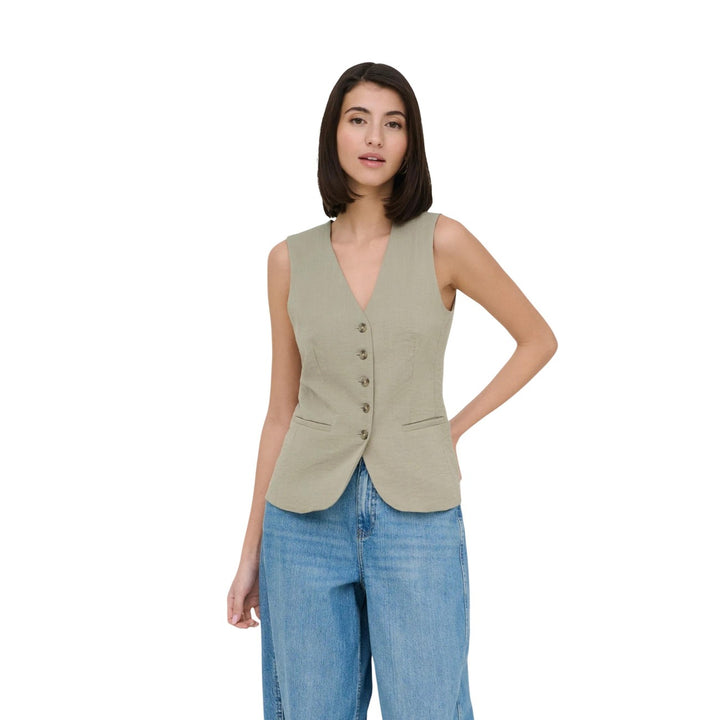 Image 1 : Gilet beige sans manches Jacqueline De Yong col V porté par mannequin femme — Delvale