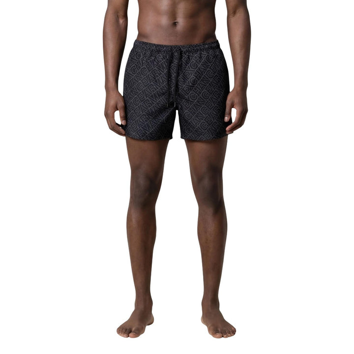 Short de bain Armani Exchange homme noir motif imprimé AX vue portée de face — polyester lacets Ref. XM000832