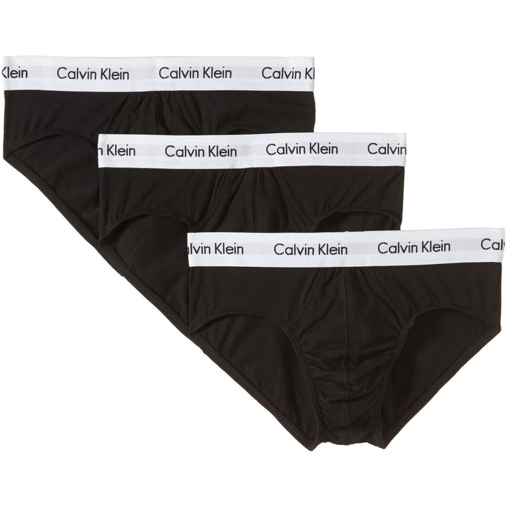 Image 1 : Lot de 3 slips homme Calvin Klein Underwear coloris noir avec ceinture élastique blanche logo Calvin Klein, vue de face superposée — Delvale