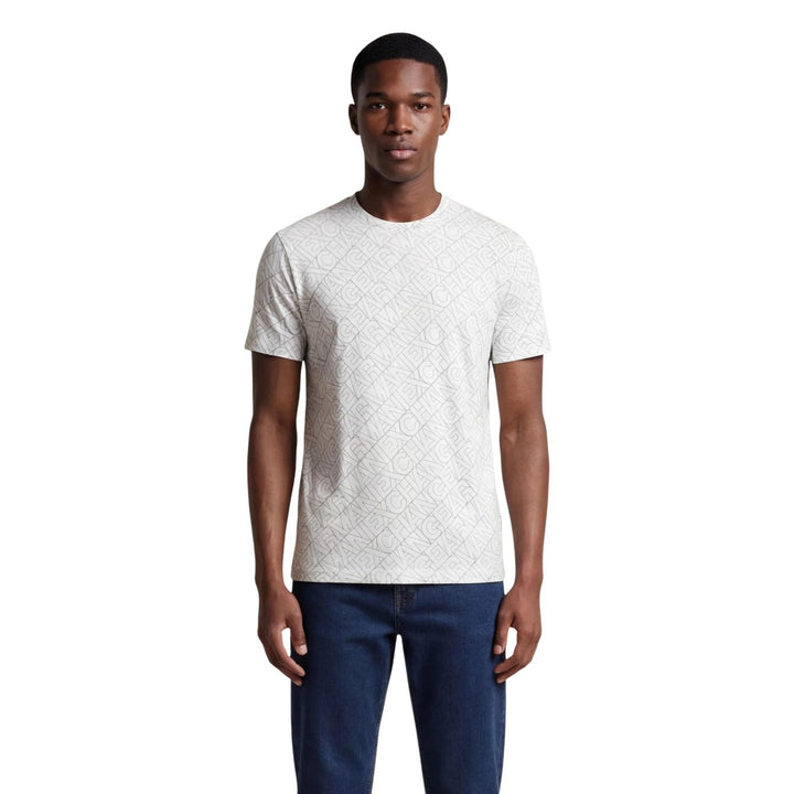 T-shirt Armani Exchange homme beige motif imprimé discret vue portée de face — coton manches courtes Ref. XM002783