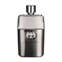Image 1 : Flacon Gucci Guilty Homme Eau de Toilette, design bicolore acier et transparent avec logo GG en relief, vue de face — Delvale
