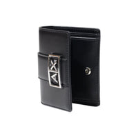 Image 2 : Détail de la plaque logo AX métal argenté sur portefeuille Armani Exchange femme noir, fermeture à pression — Delvale
