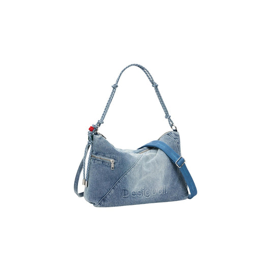 Image 2 : Détail du sac hobo Desigual bleu azur montrant la construction patchwork diagonale et la breloque rouge — Delvale