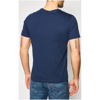 Image 2 : Vue de face du t-shirt Nike homme bleu marine à manches courtes, logo Nike brodé visible côté cœur, coupe régulière — Delvale