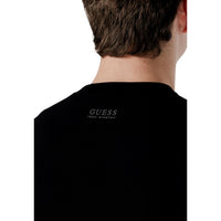 Image 2 : Pull homme Guess maille noire coupe ajustée, détail encolure ras-du-cou et bord-côte — Delvale
