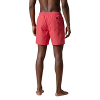 dos porté corail :
Maillot de bain Armani Exchange homme corail, dos, coupe mi-cuisse légèrement ample — Delvale