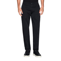 Pantalon chino Armani Exchange homme bleu marine — vue de face portée fond noir — Delvale