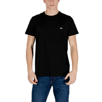 Image 4 : T-shirt Lacoste homme col rond vert, vue de face portée sur jean bleu foncé — Delvale