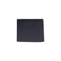 Image 3 : Détail du badge logo Tommy Hilfiger émaillé rouge, blanc et bleu sur portefeuille cuir navy homme — Delvale