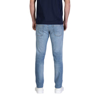 Image 2 : Jean slim homme Tommy Hilfiger Jeans bleu azur, détail tissu denim stretch avec effet délavé naturel, fermeture zip et bouton visible — Delvale