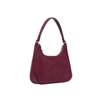 Image 2 : Calvin Klein sac trapèze femme vue profil monogramme multicolore design asymétrique — delvale