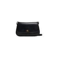 Image 1 : Sac bandoulière Calvin Klein femme noir avec rabat clip doré et monogramme CK, vue de face — Delvale
