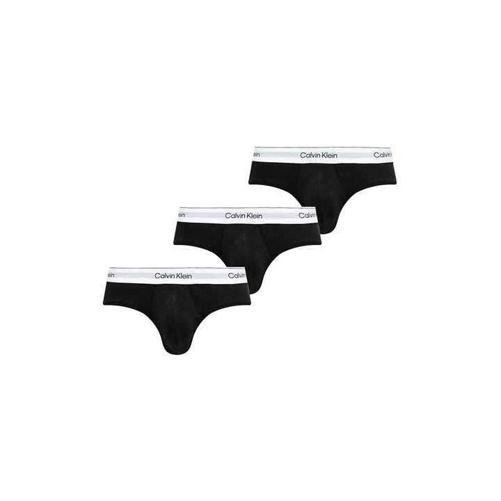 Image 1 : Lot de 3 slips Calvin Klein Underwear homme noirs avec ceinture élastique blanche logotée, vue d'ensemble en diagonal — Delvale