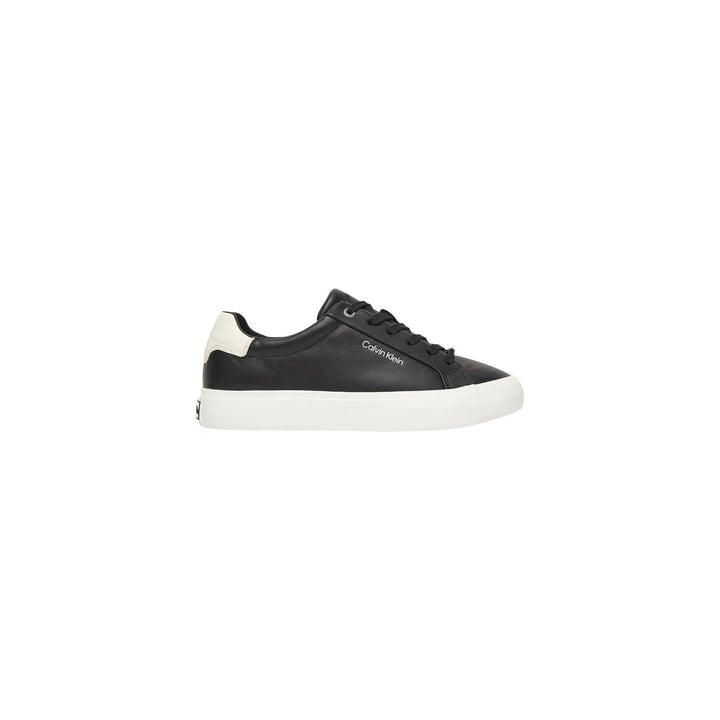Image 1 : Baskets Calvin Klein femme en cuir noir avec lacets, vue de profil — delvale