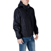 Image 3 : Vue de trois quarts du coupe-vent Armani Exchange homme à capuche, poches zippées latérales visibles — Delvale