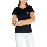 Image 4 : T-shirt Liu Jo femme blanc cassé porté sur jean taille haute, look casual-chic — Delvale