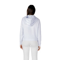 Image 2 : Détail du logo AX ton sur ton sur sweat crop blanc Armani Exchange, finition premium — Delvale