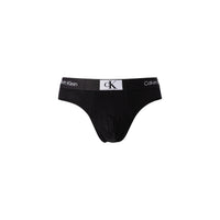 Image 2 : Vue de face de la boîte Calvin Klein Underwear 1996 avec inscription Cotton Stretch et Amplified Classics — Delvale