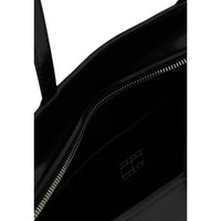 Image 4 : Sac à main cabas Tommy Hilfiger noir, vue d'ensemble profil, matière lisse et badge signature — Delvale