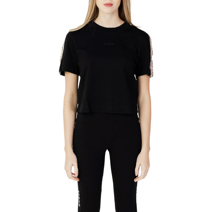 T-shirt crop Guess Active femme noir, coupe carrée courte, bandes monogramme aux épaules, logo ton sur ton centré poitrine