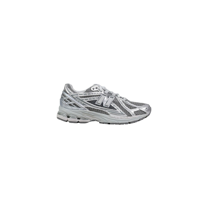 New Balance 1906R homme argenté vue de profil extérieur avec finition métallisée
