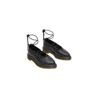 Image 2 : Dr. Martens Elphie II noires vue profil chaussures basses cuir femme — delvale