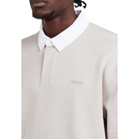 Polo Boss homme manches longues beige sable col blanc logo Boss brodé ton sur ton zoom poitrine