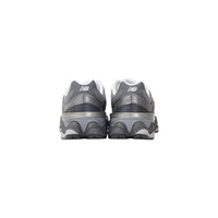 New Balance 9060 Femme Gris Anthracite Contrefort Marine Semelle Blanche — vue arrière — Delvale
