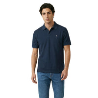 Image 1 : Polo homme Calvin Klein Jeans bleu en coton, vue de face avec col classique — Delvale