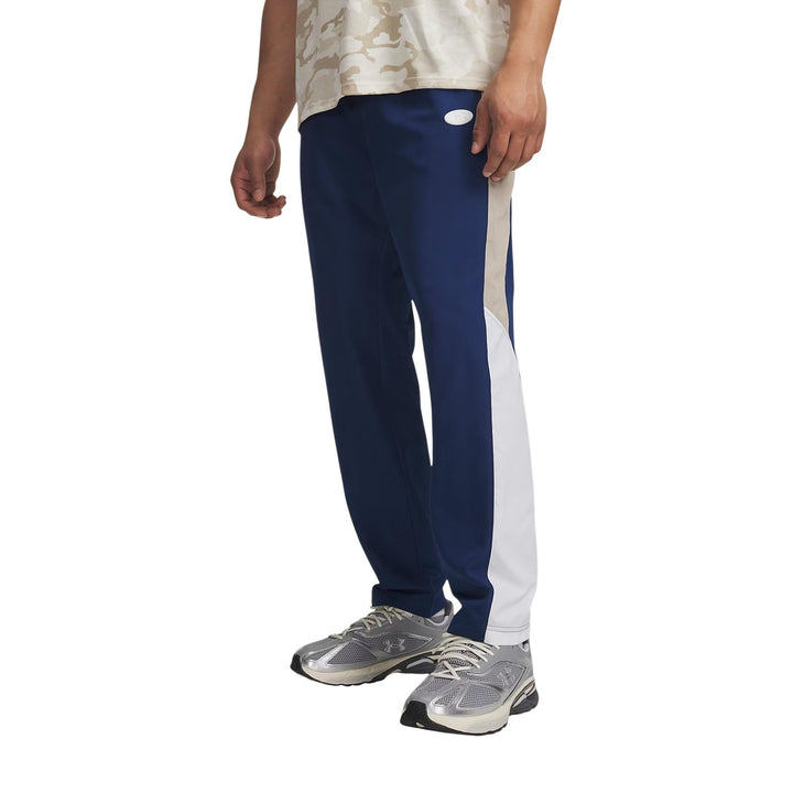 Image 1 : Pantalon sport homme Under Armour bleu vue de face, coupe ajustée — Delvale
