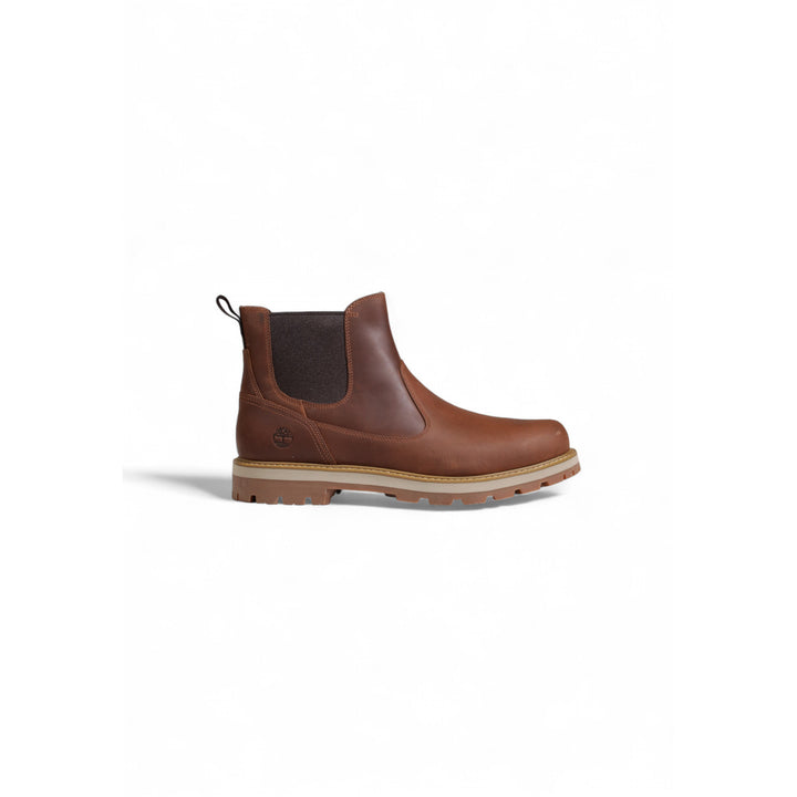 Image 1 : Chelsea boot Timberland homme en cuir marron avec semelle caoutchouc crantée bicolore, vue de profil gauche sur fond blanc — Delvale