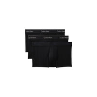Image 1 : Lot de 3 boxers Calvin Klein Underwear homme en coton stretch noir, vue de face empilés — Delvale