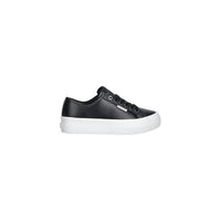 Image 1 : Baskets basses Calvin Klein Jeans femme en cuir lisse noir avec semelle plateforme blanche, vue de profil gauche — Delvale