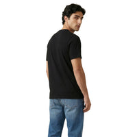 Image 2 : T-shirt Tommy Hilfiger Jeans homme noir, détail du logo et des finitions — Delvale