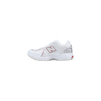 Image 3 : Baskets New Balance 1906R femme design épuré blanc rouge, vue arrière — delvale
