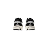 Image 4 : Vue arrière des baskets Adidas Originals Control 5 homme, contrefort renforcé noir et logo Adidas visible — Delvale
